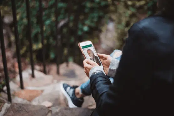 A person using online GP service, videoDoc, on a smartphone