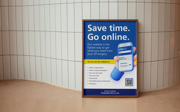 A framed NHS poster promoting online GP services is displayed against a white tiled wall. The poster has a blue background with bold white text that reads, “Save time. Go online.” Below, it states that the website is the fastest way to access GP services.
