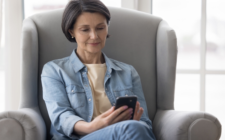 mature woman using smartphone