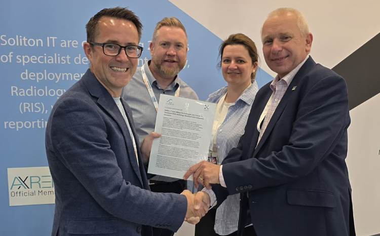 The Soliton IT and xWave team celebrating their new partnership at UKIO 2025